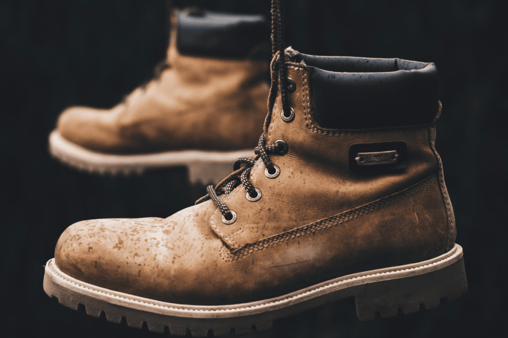 a photo of boots with a close up on the hiking boot laces