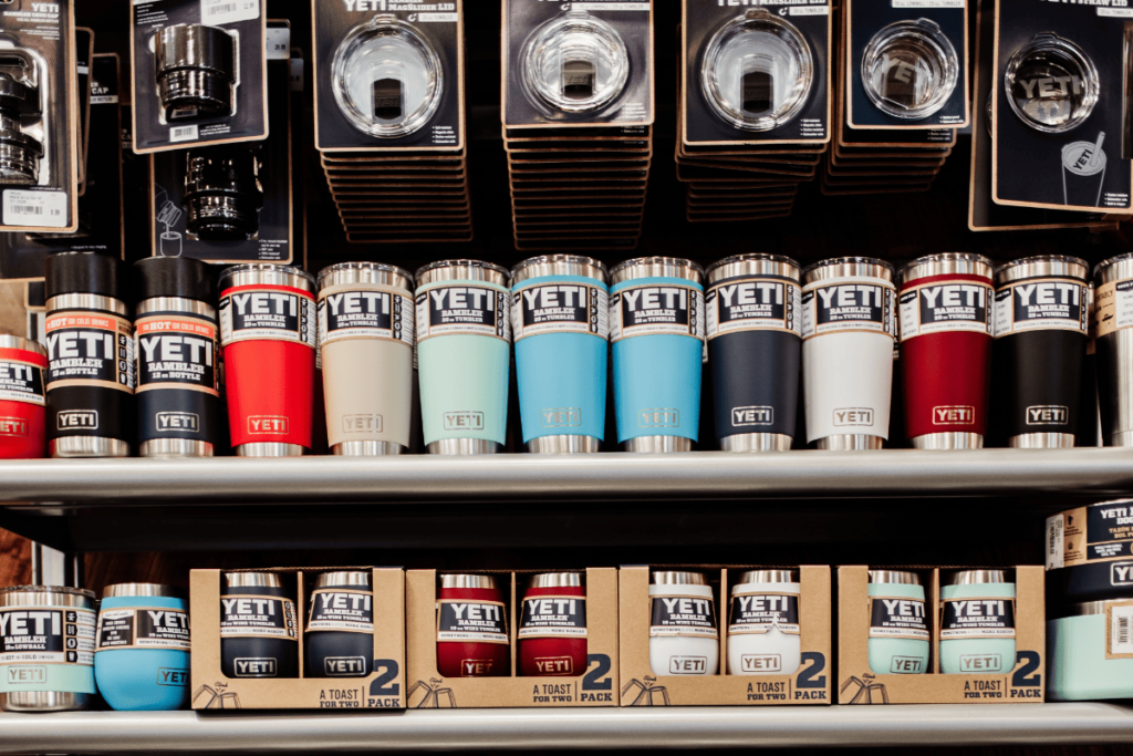 a photo of Yeti water bottles on display at a store.